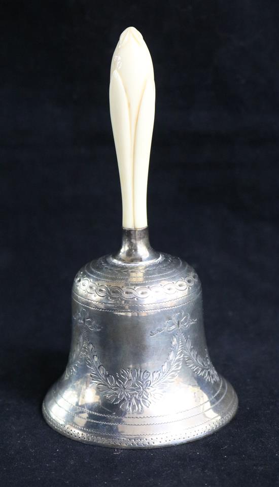 A Victorian silver hand bell by Martin, Hall & Co, Sheffield, 1877, with carved ivory handle, 15.5cm.